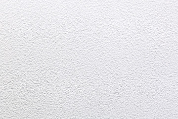 white bumpy wall background. high-detailed vinyl wallpaper imitating plaster wall series