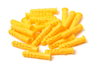 Plastic wall dowel plugs on white background