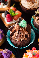 set of pastries on the black background