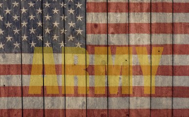vintage american flag and army logo painted on the side of a weathered wood barn wall