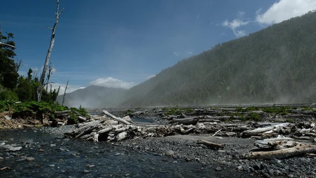 Sandy storm in the valley surrounded by mountains. Chilean Patagonia
