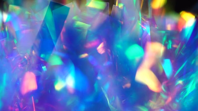 Neon, pink, purple, blue colors abstract vibrant iridescent background. Light through a crystal prism