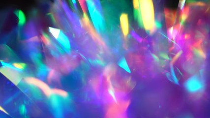Neon, pink, purple, blue colors abstract vibrant iridescent background. Light through a crystal prism