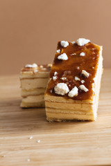 Creamy sponge cake over wood