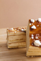 Creamy sponge cake over wood