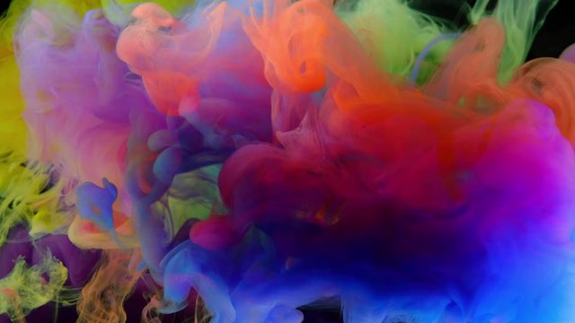 4K, Colorful paint drops mixing in water, abstract color mixing in water slow motion, drop of Ink color falling on water,  4K footage,