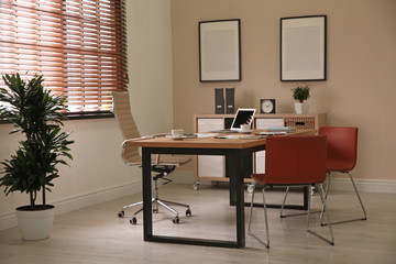 Director's office with large wooden table. Interior design