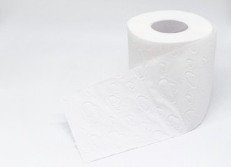 Roll of white toilet paper with perforation on a white background