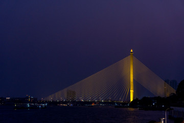 Fototapeta na wymiar Rama VIII Bridge, Bangkok, from aboard the Chao Phraya River