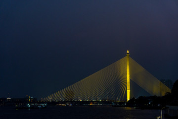 Obraz na płótnie Canvas Rama VIII Bridge, Bangkok, from aboard the Chao Phraya River