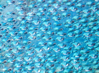 Drops of water on a blue background
