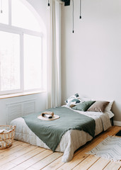 Scandinavian style bedroom design, light room, bed, stairs, chair, modern minimalist interior, eco-friendly , decorative elements, spring, tropics, large Windows , plants, wooden floors