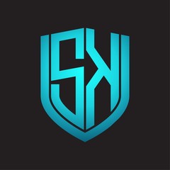 SK Logo monogram with emblem shield design isolated with blue colors on black background
