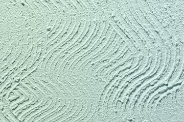 blue loft corrugated plaster on wall texture - nice abstract photo background