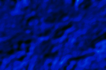 gradient abstract texture with curved spots of fancy in 2020 color Phantom Blue - looks like deep dark blue water - creative design background
