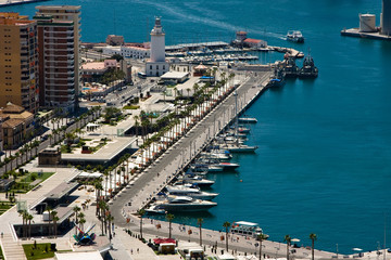Port and buildings near the blue sea bay
