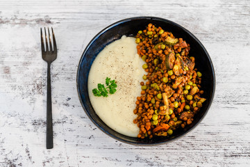 vegan lentils and potato mash dish with mixed veggies inspired by shepherd's pie