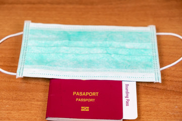 Coronavirus and travel concept. The concept of restrictions for tourism. Passport and protective medical masks. Covid19 Corona virus disease danger pandemic spread worldwide global