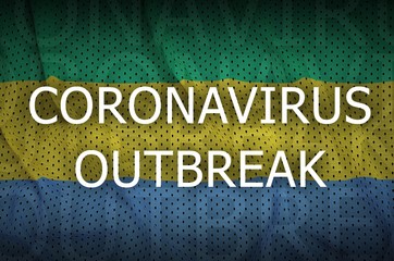 Gabon flag and Coronavirus outbreak inscription. Covid-19 or 2019-nCov virus