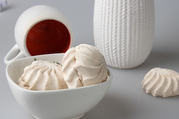 Still life of white objects and cups