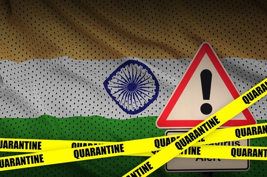 India flag and Covid-19 quarantine yellow tape. Coronavirus or 2019-nCov virus