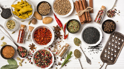 Different spices, kitchen herbs and seeds for tasty meals