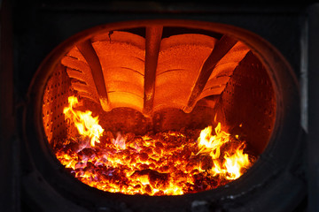 Burning coal in a furnace of a steam engine train - obrazy, fototapety, plakaty