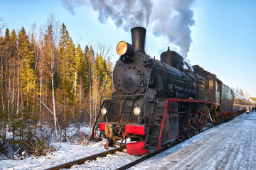 Fototapeta na wymiar Ruskeala express vintage train in Karelia