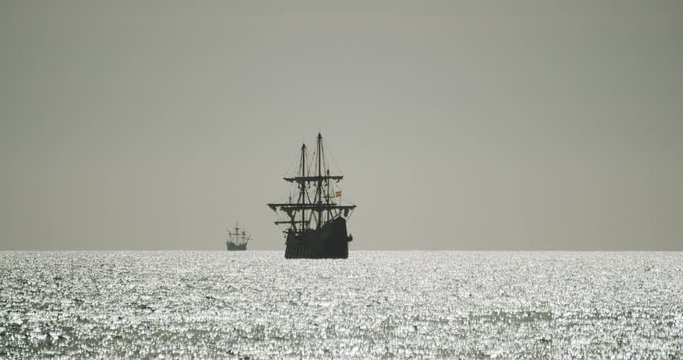 Two Christopher Columbus caravel replica ships sail in the mediterranean sea in Valencia crossing in front