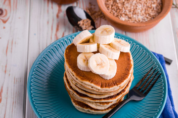 Delicious and lush pancakes with fresh fruits and berries, poured with salted caramel.