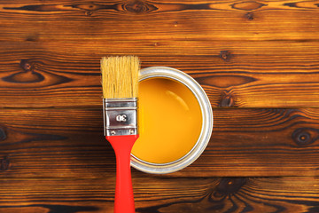 House renovation, paint can on the old wooden background with copy space - Image