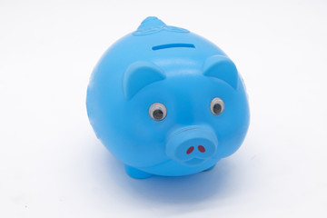 Blue piggy bank or money box isolated on a white background
