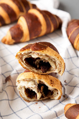Homemade Croissants with Chocolate, side view. Close-up.