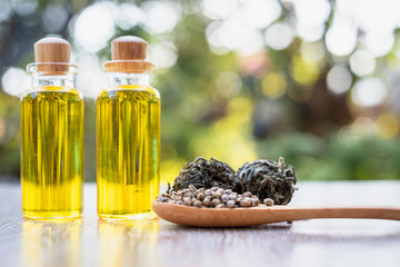 Glass bottles containing hemp oil, CBD and medicine extracted from hemp oil. Concept Medical options CBD hemp oil products Therapy with herbs that are extracted from cannabis.