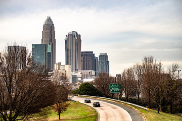 Fototapeta premium sunset and overcast over charlotte nc cityscape