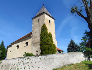 Fototapeta na wymiar Old gothic church in village Jezov near Svihov dam, typically rural religious building Czech Republic