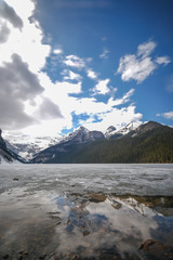 Obraz na płótnie Canvas Mount fairview, partly frozen lake, Lake Louise Banff National Park, Alberta Canada