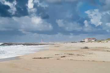 Fototapeta na wymiar Sandy coast of the Atlantic ocean in Costa Nova