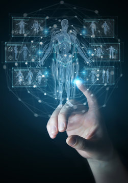 Man hand using digital x-ray human body holographic scan projection 3D rendering