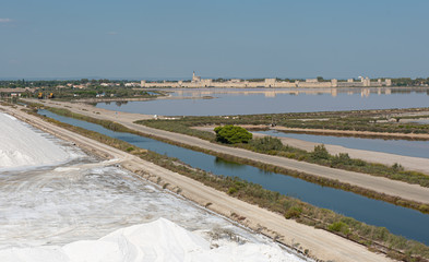 Aigues-Mortes, Salins du Midi, panorama with pink lake and Aigues-Mortes in background