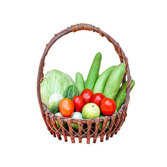 Organic fresh vegetables in wood basket gift isolated on white background and clipping path