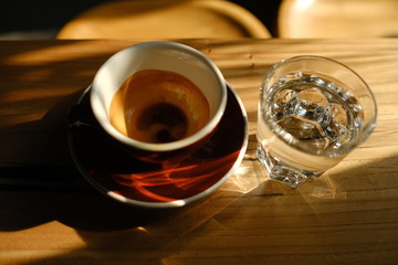 Stylish served specialty alternative black coffee. Filter pour-over coffee served in crystal glass and decanter. Aesthetics coffee