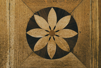 Fragment of the drawing of an old parquet made of natural wood.