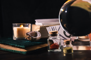 Occult and mystical objects isolated on black