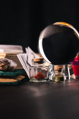 Occult and mystical objects on black background