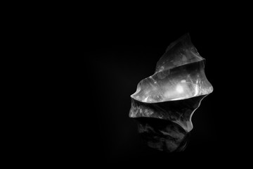 Beautiful polished spiral shaped piece of raw jasper, monochrome minimalist style 