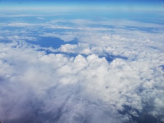 Sky and cloud view from side on the airplane