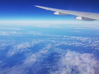 Sky and cloud view from side on the airplane