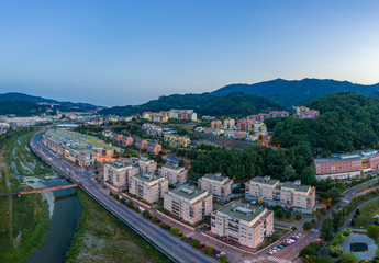 Fototapeta na wymiar Aerial view of Genoa city townscape in summer evening, Italy