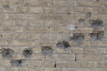 Bullet holles on the brick wall